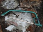 A saw with a hardened blade and a comfortable handle, for cutting timber, metal, or masonry.