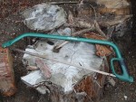 A saw with a hardened blade and a comfortable handle, for cutting timber, metal, or masonry.