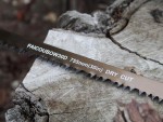 A saw with a hardened blade and a comfortable handle, for cutting timber, metal, or masonry.