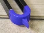 A Faithfull needle file with a hardened steel abrasive surface and a turned wooden or synthetic handle, for shaping and deburring metal.