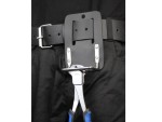 A cutting knife with a steel blade and an ergonomic handle, for general site and workshop use.