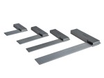 Four metal try squares of varying sizes are arranged diagonally on a white background, each with a thick rectangular handle and a flat, straight blade used for measuring and marking right angles.
