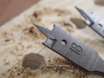 A metal concrete screw anchor with a partially threaded shaft and a drill point tip, designed for direct fixing into pre-drilled holes in concrete or masonry.