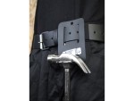 A hammer with a steel head and a steel-handled handle, for general fastening and construction use.