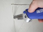 A saw with a hardened blade and a comfortable handle, for cutting timber, metal, or masonry.