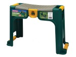A green and yellow plastic garden kneeler with a gray padded top, sturdy legs, and product labels attached to the front and side showing usage instructions and branding.