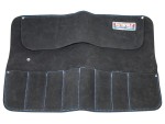 A hardened steel chisel with a bevelled cutting edge and a square-section body, for cutting stone, brick, or timber.