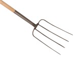 A Faithfull garden fork with four hardened steel tines and a wooden handle, for breaking up soil and lifting root vegetables.
