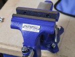 A Faithfull clamp with an adjustable jaw and a screw-tightening mechanism, for holding workpieces in position during cutting, drilling, or bonding.