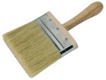 A dust brush with soft synthetic bristles and a wooden handle, for sweeping debris and dust from surfaces.