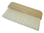 A brush with natural or synthetic bristles and an ergonomic handle, for applying coatings or cleaning surfaces.