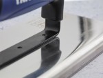 A Faithfull trowel with a polished steel blade and an ergonomic handle, for applying and finishing mortar, plaster, and adhesive.