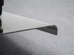 A Faithfull trowel with a polished steel blade and an ergonomic handle, for applying and finishing mortar, plaster, and adhesive.