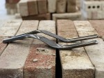 A Faithfull hand tool with a metal working end and an ergonomic handle, designed for general construction and maintenance tasks.