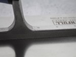 A Faithfull notched tile trowel with 115mm notches for combing adhesive on floors and walls, ensuring even coverage beneath tiles.