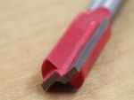 A Faithfull plunge router with a fine depth adjuster and a guide fence, for cutting grooves, rebates, and profiles in timber.