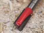 A Faithfull plunge router with a fine depth adjuster and a guide fence, for cutting grooves, rebates, and profiles in timber.
