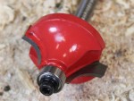 A Faithfull plunge router with a fine depth adjuster and a guide fence, for cutting grooves, rebates, and profiles in timber.