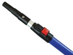 Close-up of a blue telescopic pole with a black plastic locking mechanism and a red push button for adjusting the poles length.,