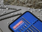A set of 10 Faithfull screwdrivers with colour-coded handles covering a range of flathead and Phillips sizes.,