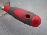 A Faithfull trowel with a polished steel blade and an ergonomic handle, for applying and finishing mortar, plaster, and adhesive.