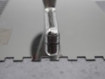 A Faithfull notched tile trowel with 6mm notches for combing adhesive on floors and walls, ensuring even coverage beneath tiles.