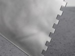 A Faithfull notched tile trowel with 6mm notches for combing adhesive on floors and walls, ensuring even coverage beneath tiles.