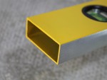 A Faithfull 120cm box-section spirit level with 3 vials, with a milled-edge aluminium body and shock-resistant end caps, for checking accurate levels on site.