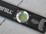 A Faithfull 60cm spirit level with an extruded aluminium body and accurate vials, for checking horizontal and vertical alignment.
