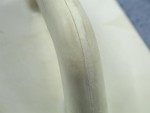 A brush with natural or synthetic bristles and an ergonomic handle, for applying coatings or cleaning surfaces.
