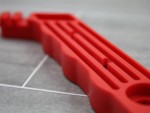A cutting knife with a steel blade and an ergonomic handle, for general site and workshop use.