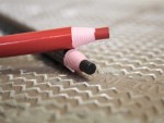 A marking tool with a hardened scribing tip or pencil lead, used for accurately marking cut lines on timber, metal, and masonry.