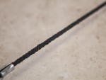 A saw with a hardened blade and a comfortable handle, for cutting timber, metal, or masonry.