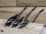 A set of 3 Faithfull screwdrivers with colour-coded handles covering a range of flathead and Phillips sizes.,