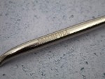 A Faithfull trowel with a polished steel blade and an ergonomic handle, for applying and finishing mortar, plaster, and adhesive.