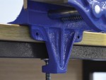 A Faithfull clamp with an adjustable jaw and a screw-tightening mechanism, for holding workpieces in position during cutting, drilling, or bonding.