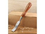 A hardened steel chisel with a bevelled cutting edge and a square-section body, for cutting stone, brick, or timber.
