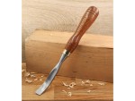 A hardened steel chisel with a bevelled cutting edge and a square-section body, for cutting stone, brick, or timber.