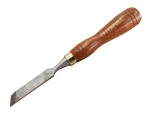 A hardened steel chisel with a bevelled cutting edge and a square-section body, for cutting stone, brick, or timber.