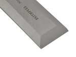 A bevel-edge wood chisel with a hardened steel blade and a polymer or wooden handle, for paring and chopping joints in timber.