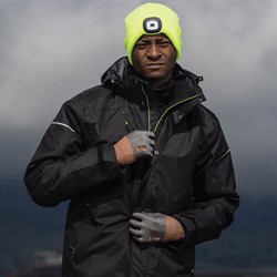 Man wearing Portwest All Weather Protection Jacket and Beanie